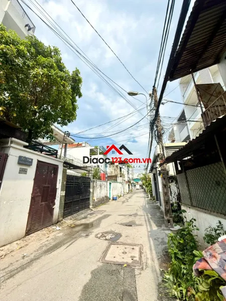 Hạ giá 36,5 tỷ: tòa nhà mt ngay phan văn trị, bình thạnh - 10x20m - hầm 5 tầng, hđt 10 năm