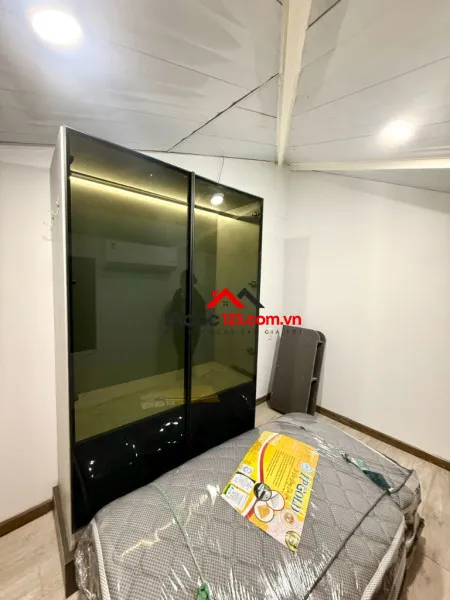 Hạ giá 36,5 tỷ: tòa nhà mt ngay phan văn trị, bình thạnh - 10x20m - hầm 5 tầng, hđt 10 năm